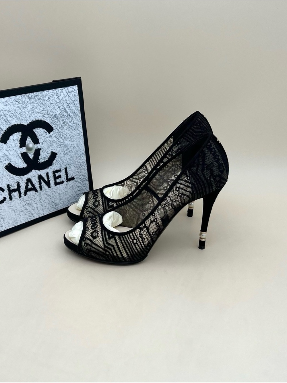 CHANEL Black Lace Peep-Toe Stilettos with Signature Heel Accent